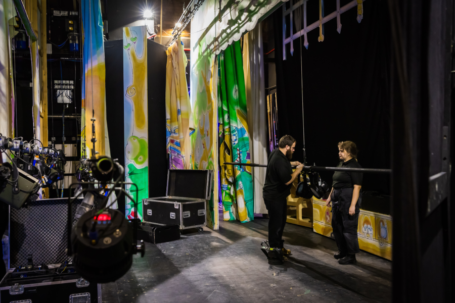 Theatre technicians preparing the stage