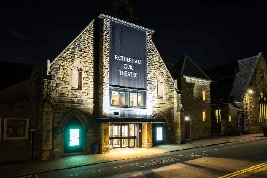 Rotherham Civic Theatre entrance lit up at night